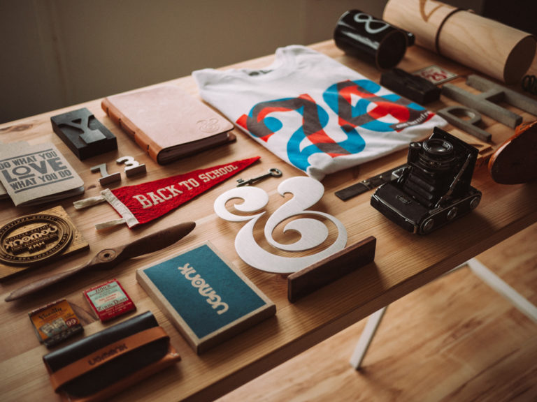 basics-of-branding-peterman-firm-blog-branded-objects-on-a-table