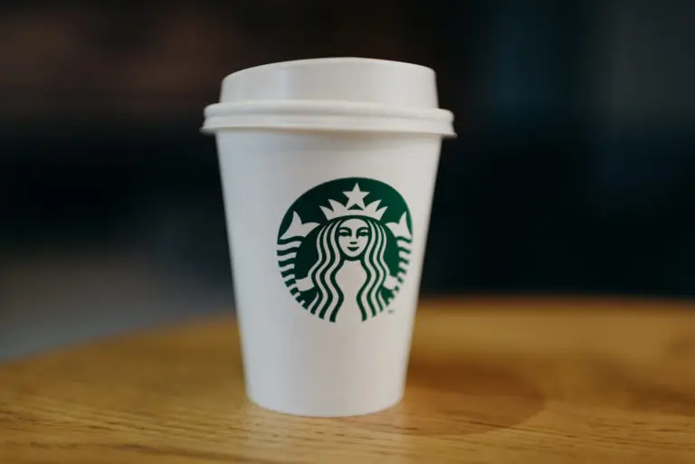 5-reasons-why-packaging-design-matters-peterman-firm-blog-starbucks-coffee-cup-on-wood-table